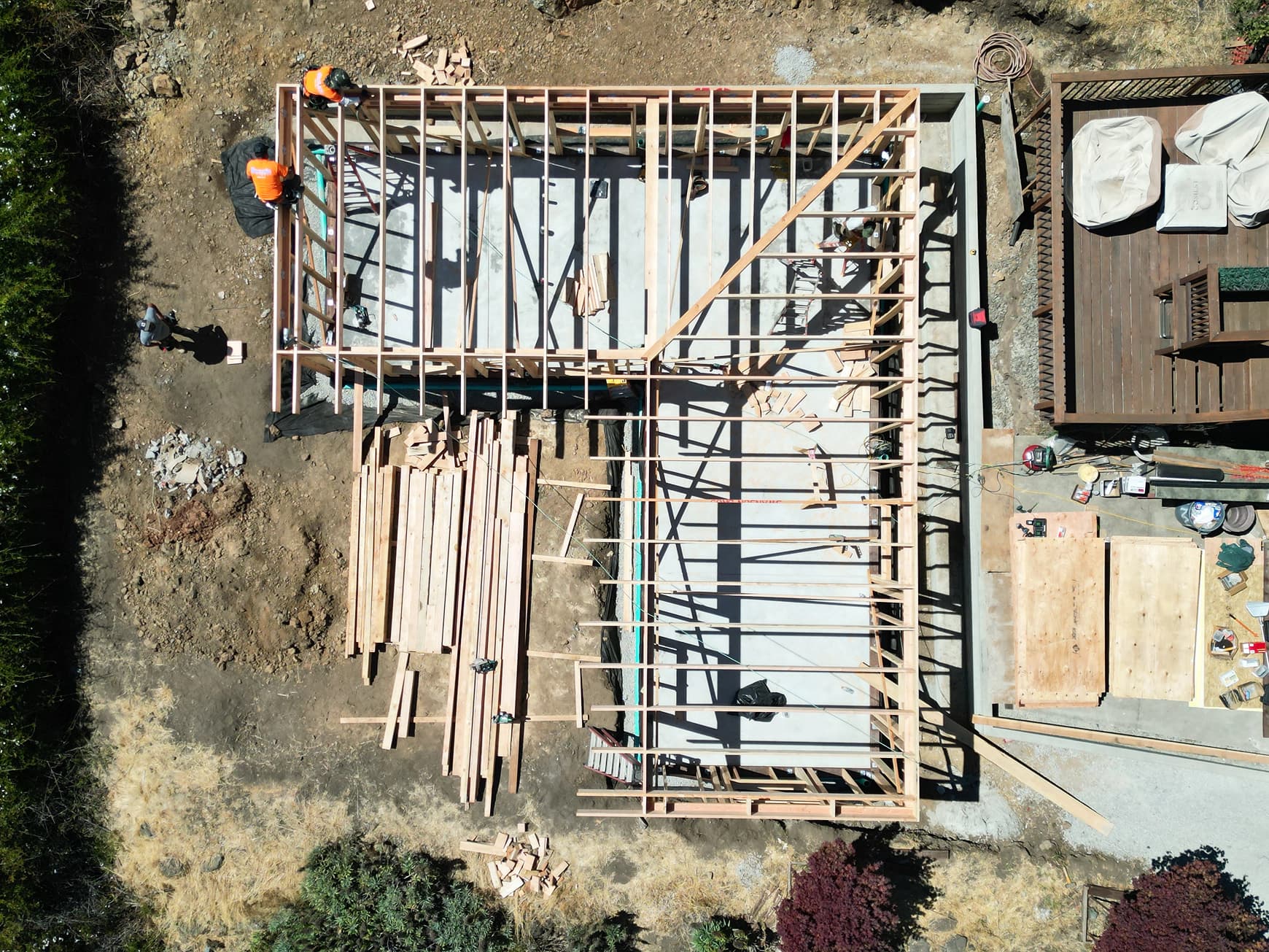 Type Five on-site construction process showing efficient modular building techniques with skilled craftspeople creating quality structures